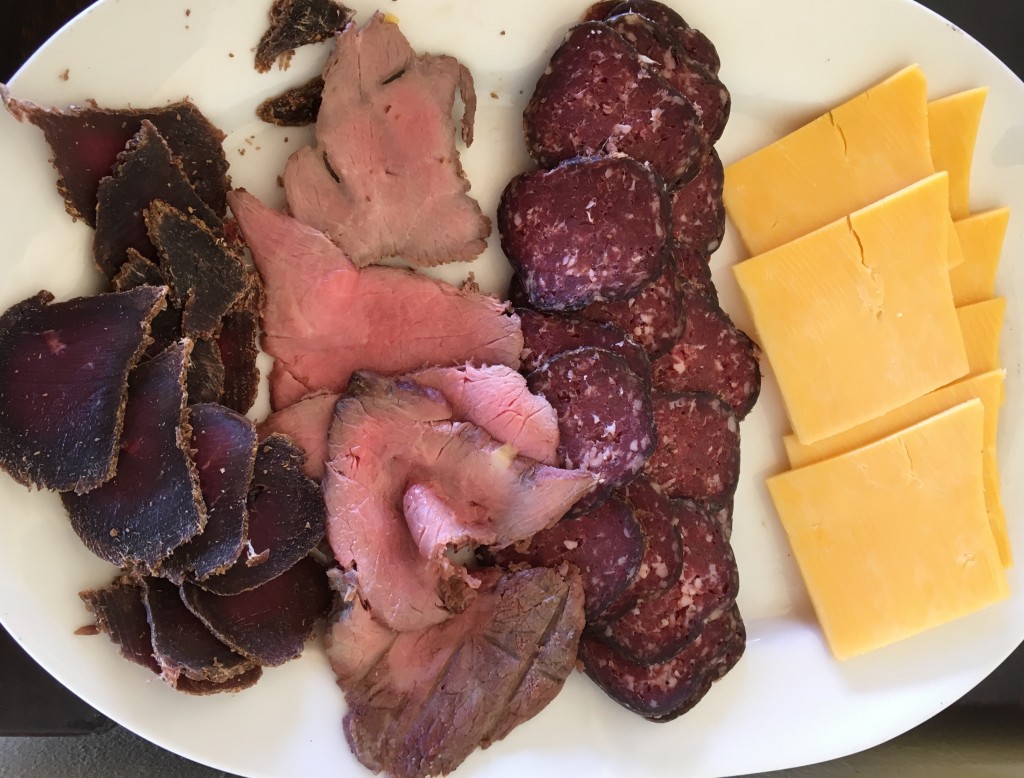 from left to right: smoked kudu, sliced zebra steak, zebra salami, cheese