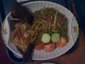 Guinean baked fish with peas